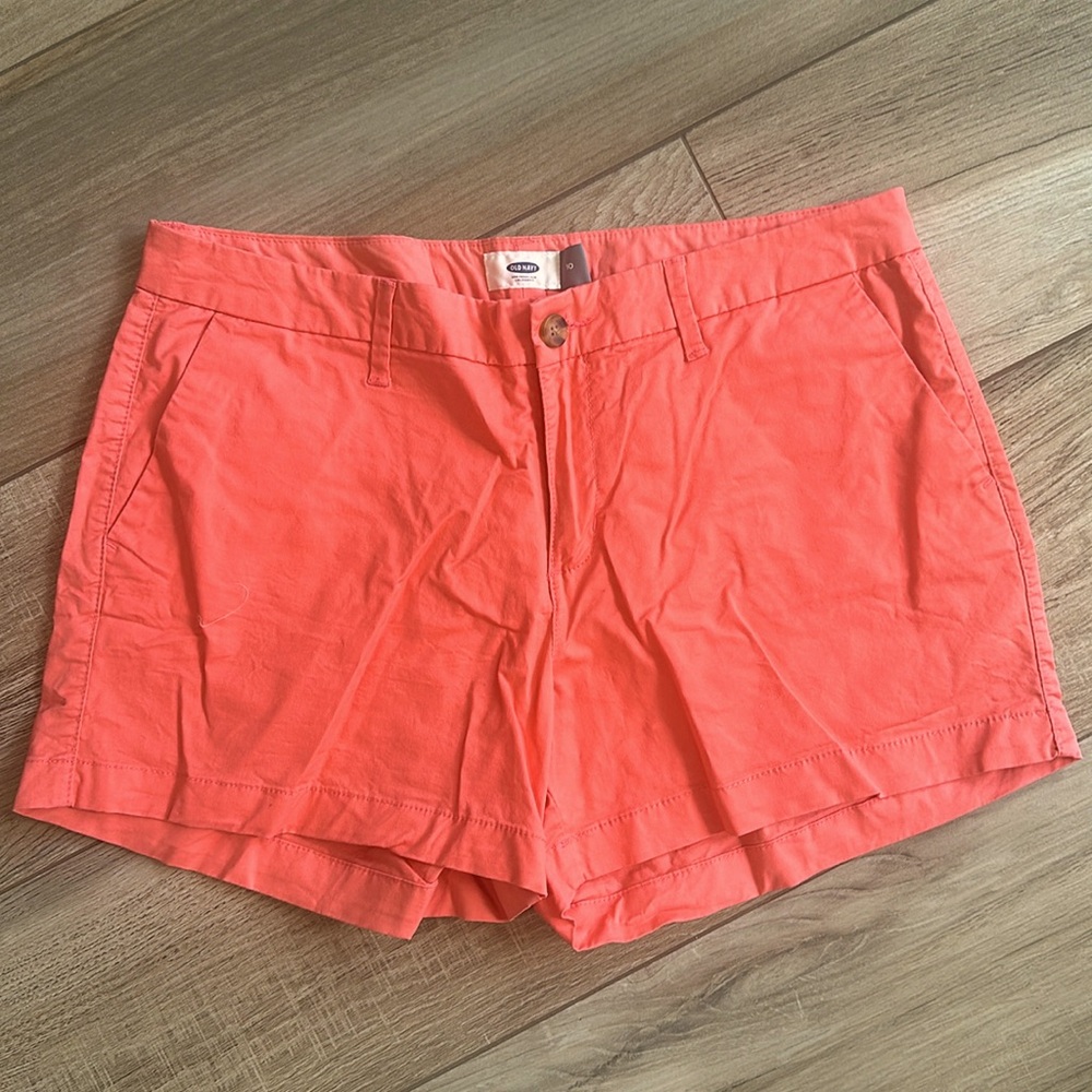 Bright coral colored shorts